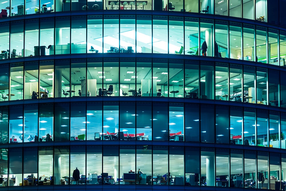 An external shot looking into a busy office